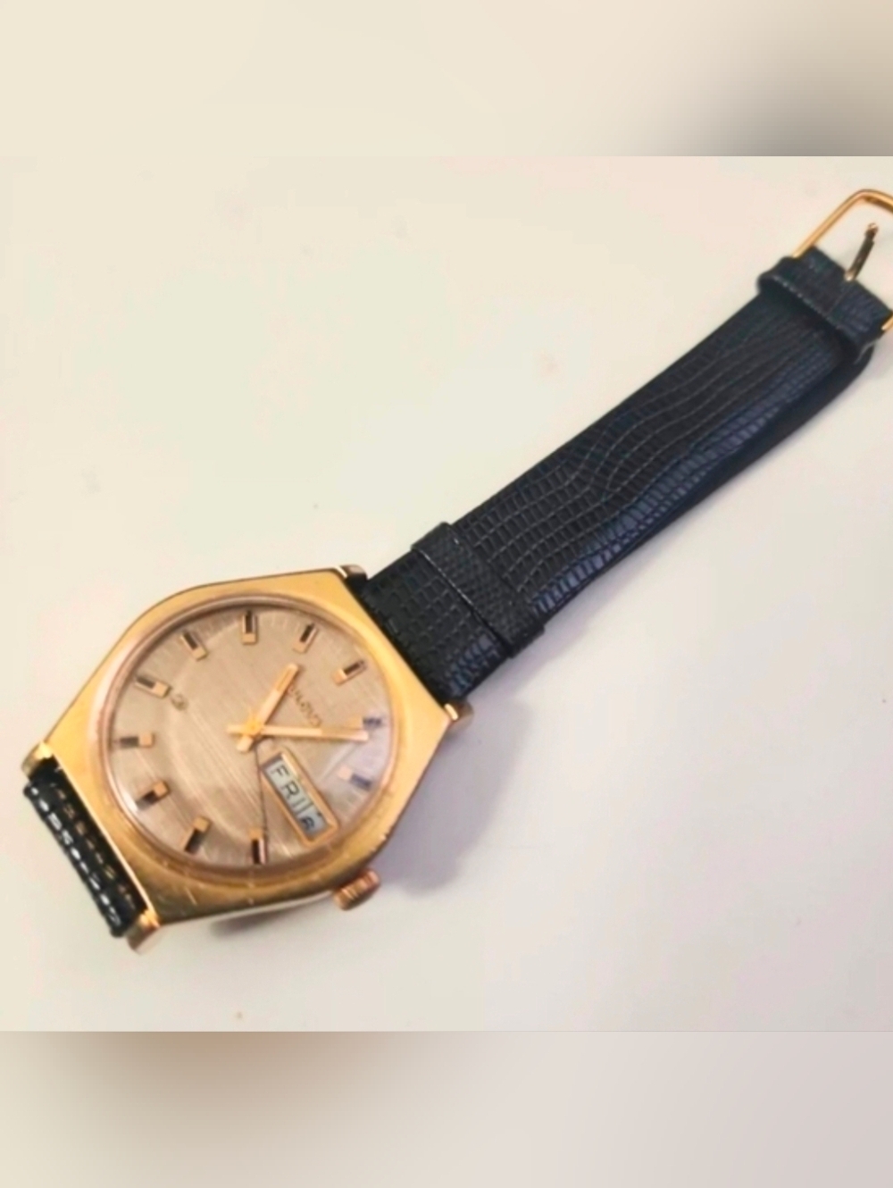 Bulova Gold-Tone Unisex Watch with Black Strap